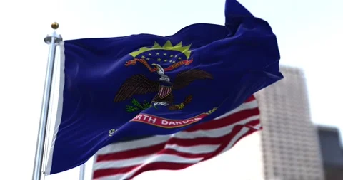 The flag of the US state of North Dakota waving in the wind Stock Footage 160940625