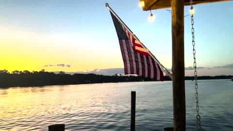 Flag on the water sunset stock Stock-Footage 200000909