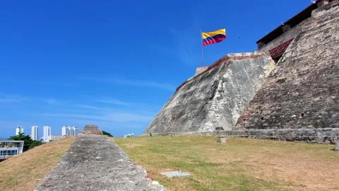 Flag wavering in front of Castle of Saint Philippe, Castillo San Felipe de Stock Footage 166189478