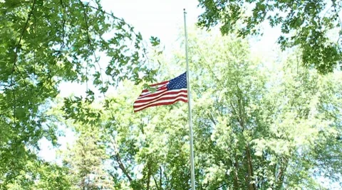 Flag waves at half staff Stock Footage 7753722