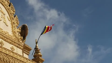 Flag waves over temple Stock Footage 10584384