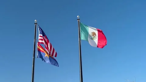 A flag waving along the town of Tucson, Arizona Stock Footage 209735751