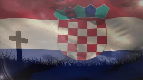 Flag waving, breeze causing checker shield folds and sun flare shifting over Stock Footage 330740891