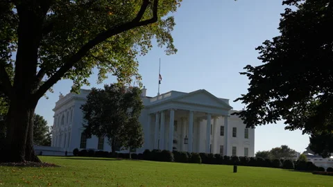 Flag Waving at Half Staff at the White House in Washington DC Stock Footage 252599966