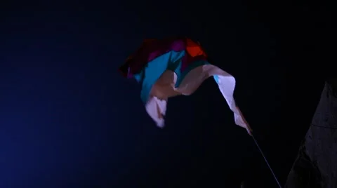 Flag waving lite at night wind Stock Footage 45531404