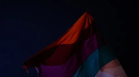 Flag waving lite at night wind Stock Footage 45531405