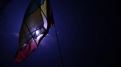 Flag waving lite at night wind Stock Footage 45591589