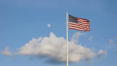 Flag waving with moon in background Video stock 122698012