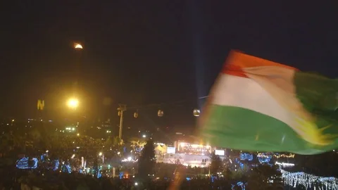 Flag waving over crowd Kurdish Newroz Stock Footage 81802663