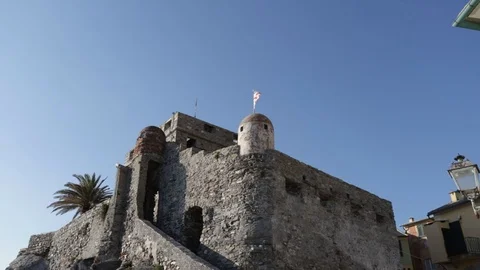 Flag waving on the sentry box of an ancient castle 01 Stock Footage 109016337