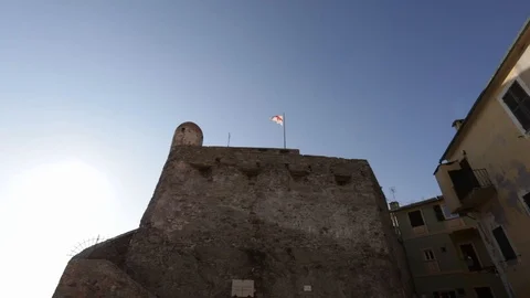 Flag waving on the sentry box of an ancient castle 04 Stock Footage 109017826