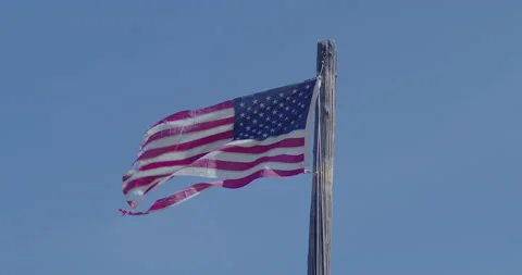 Flag in Wind Old Torn Flag Windy Western Stock Footage 194417073