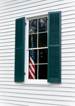 Flag in window Stock Photos