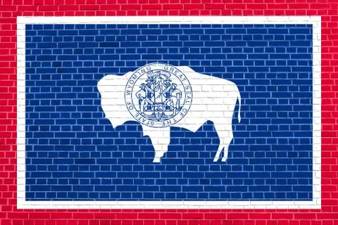 Flag of Wyoming on brick wall texture background Stock Illustration