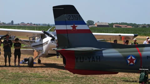 Flag of Yugoslavia with red star on tail of jet fighter plane of the balkan wars Stock Footage 218744320