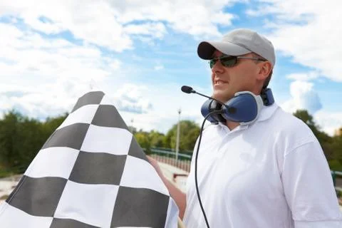 Flagman with checkered flag Stock Photos