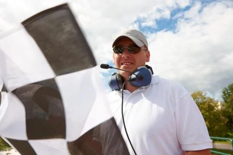 Flagman with checkered flag Stock Photos