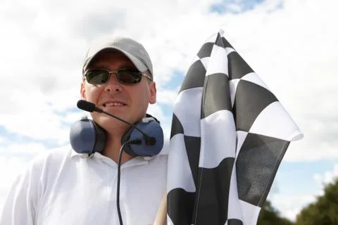 Flagman with checkered flag Stock Photos