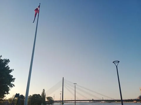 Flagpole and Cable-Stayed Bridge Over the Daugava in Riga, Latvia Stock Photos