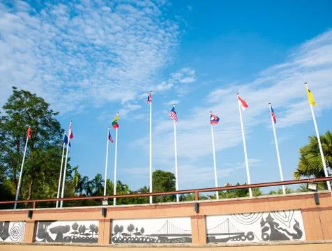 Flags of AEC on blue sky background. Stock Photos