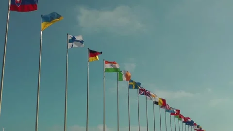 Flags of all nations are flying Видео 343392440