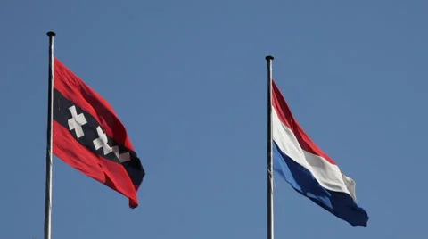 Flags of Amsterdam and the Netherlands Waving in the Wind Stock Footage 40449144