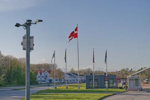 Flags and surveillance camera along a Road in Denmark Stock Photos