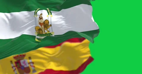 Flags of Andalusia ans Spain waving isolated on green background Stock Footage 309339945