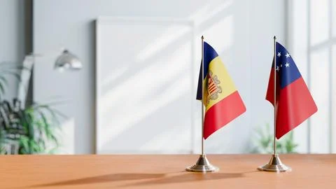 FLAGS OF  ANDORRA AND SAMOA  ON TABLE Stock Photos