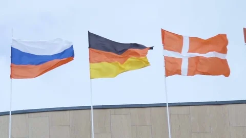 Flags are fluttering in the wind against the sky. Flags of Russia, Germany, D Stock-Footage 78127062