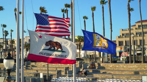 Flags are waving in clear skies, CA.  Stock Footage 339037589