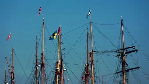 Flags are waving on flagpoles Stock Footage 128992626