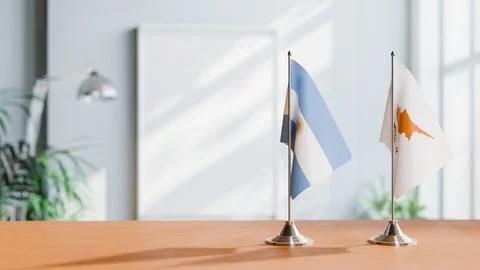 FLAGS OF  ARGENTINA AND CYPRUS  ON TABLE Stock Photos