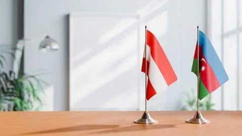 FLAGS OF  AUSTRIA AND AZERBAIJAN  ON TABLE Stock Photos