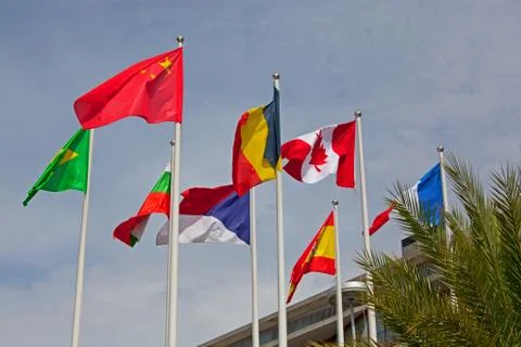 Flags  on the background of the blue sky Stock Photos