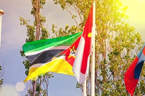 Flags  on the background of the blue sky in the sunlight Stock Photos