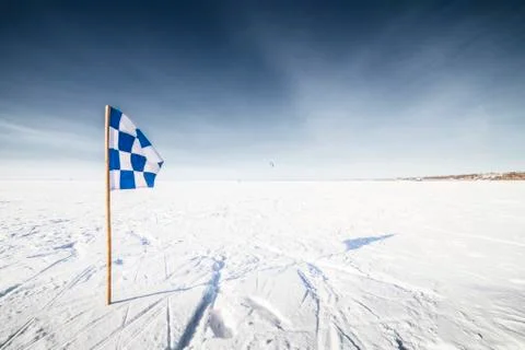 Flags on the background of winter sky Stock Photos