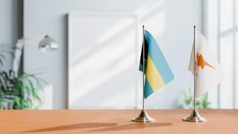 FLAGS OF  BAHAMAS AND CYPRUS  ON TABLE Stock Photos