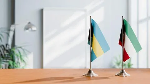 FLAGS OF  BAHAMAS AND KUWAIT  ON TABLE Stock Photos