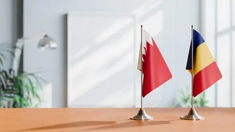 FLAGS OF  BAHRAIN AND ROMANIA  ON TABLE Stock Photos