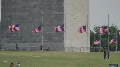 Flags at the base of the Washington Monument Stock Footage 345278569