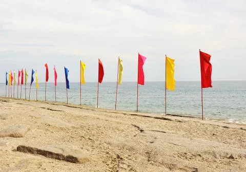 Flags on the beach Stock Photos