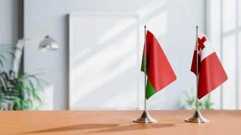 FLAGS OF  BELARUS AND TONGA  ON TABLE Stock Photos