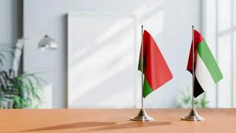 FLAGS OF  BELARUS AND UAE  ON TABLE Stock Photos