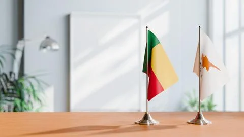 FLAGS OF BENIN AND CYPRUS ON TABLE Stock Photos