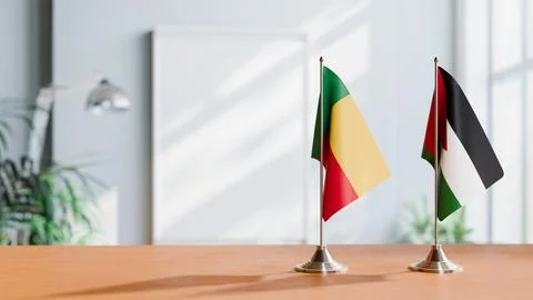 FLAGS OF BENIN AND JORDAN ON TABLE Stock Photos