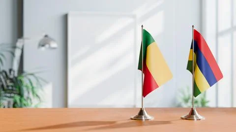 FLAGS OF BENIN AND MAURITIUS ON TABLE Stock Photos