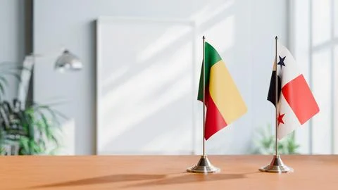 FLAGS OF BENIN AND PANAMA ON TABLE Stock Photos