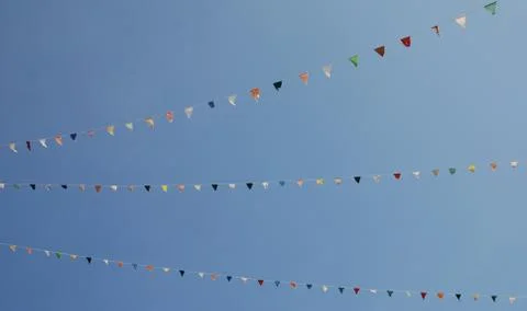 Flags in Blue Sky Stock Photos