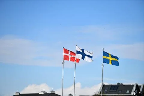 Flags in blue sky Stock Photos